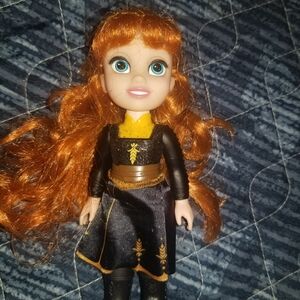 Charming Doll with Orange Hair and Black Dress